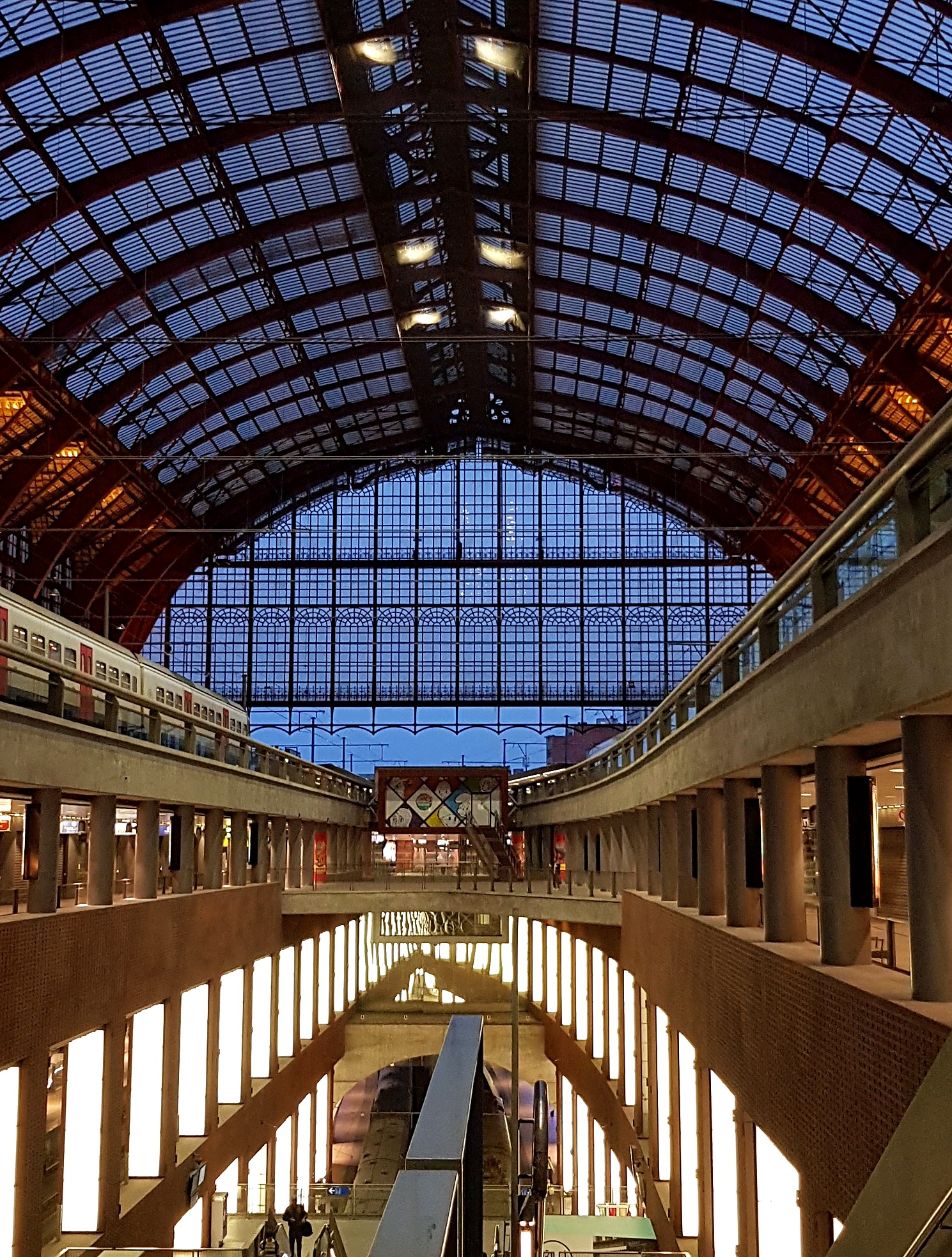 Interior of Antwerpen-Centraal beneath its monumental glass-and-iron train hall