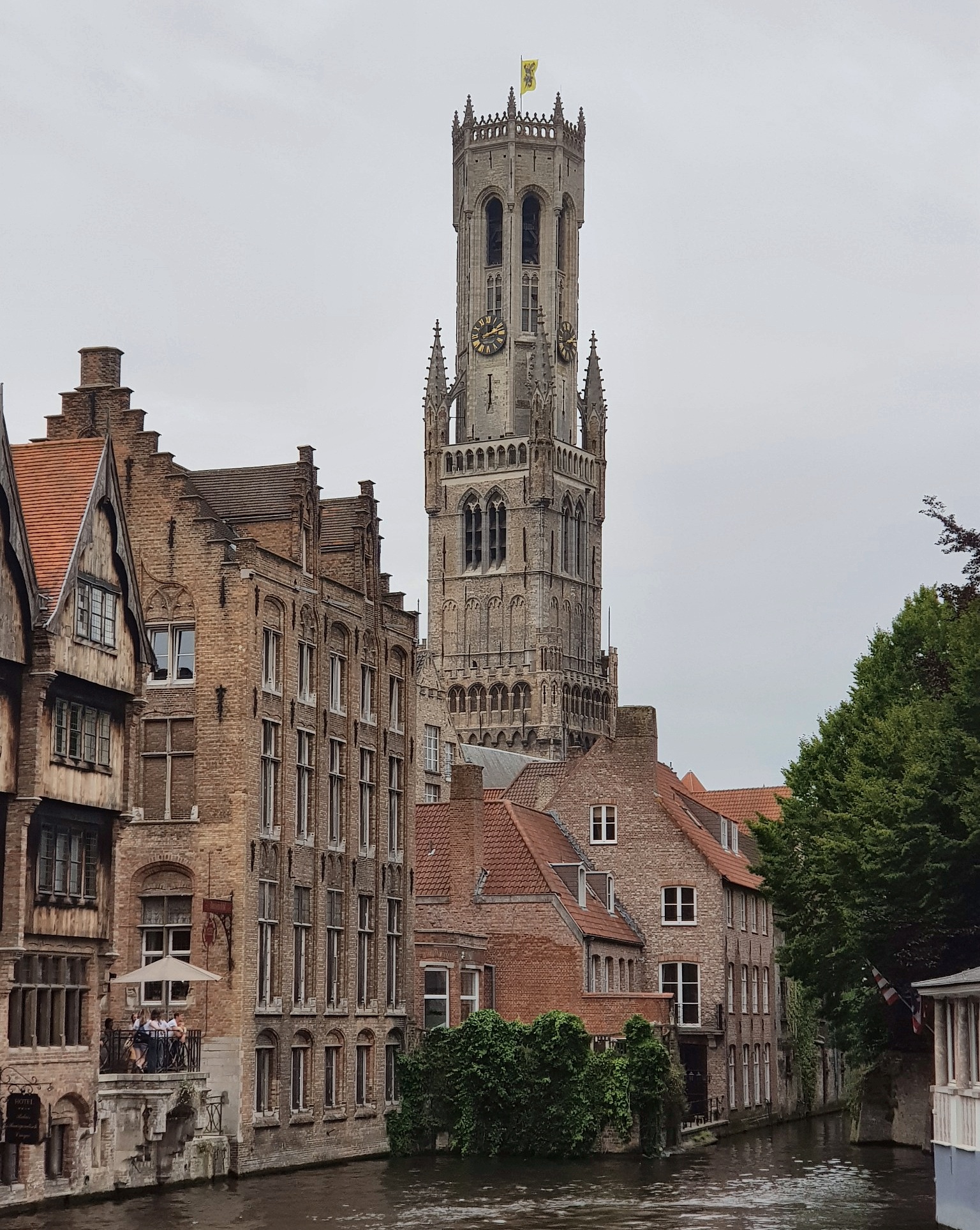 Bruges canal with the Belfry rising above the historic centre
