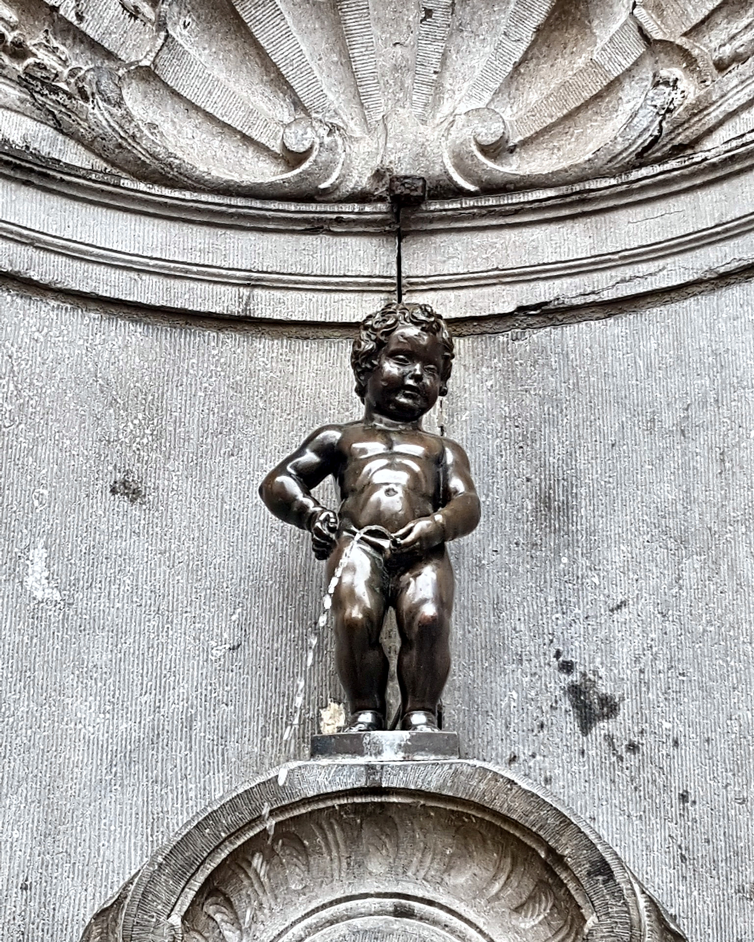 Manneken Pis fountain statue in central Brussels