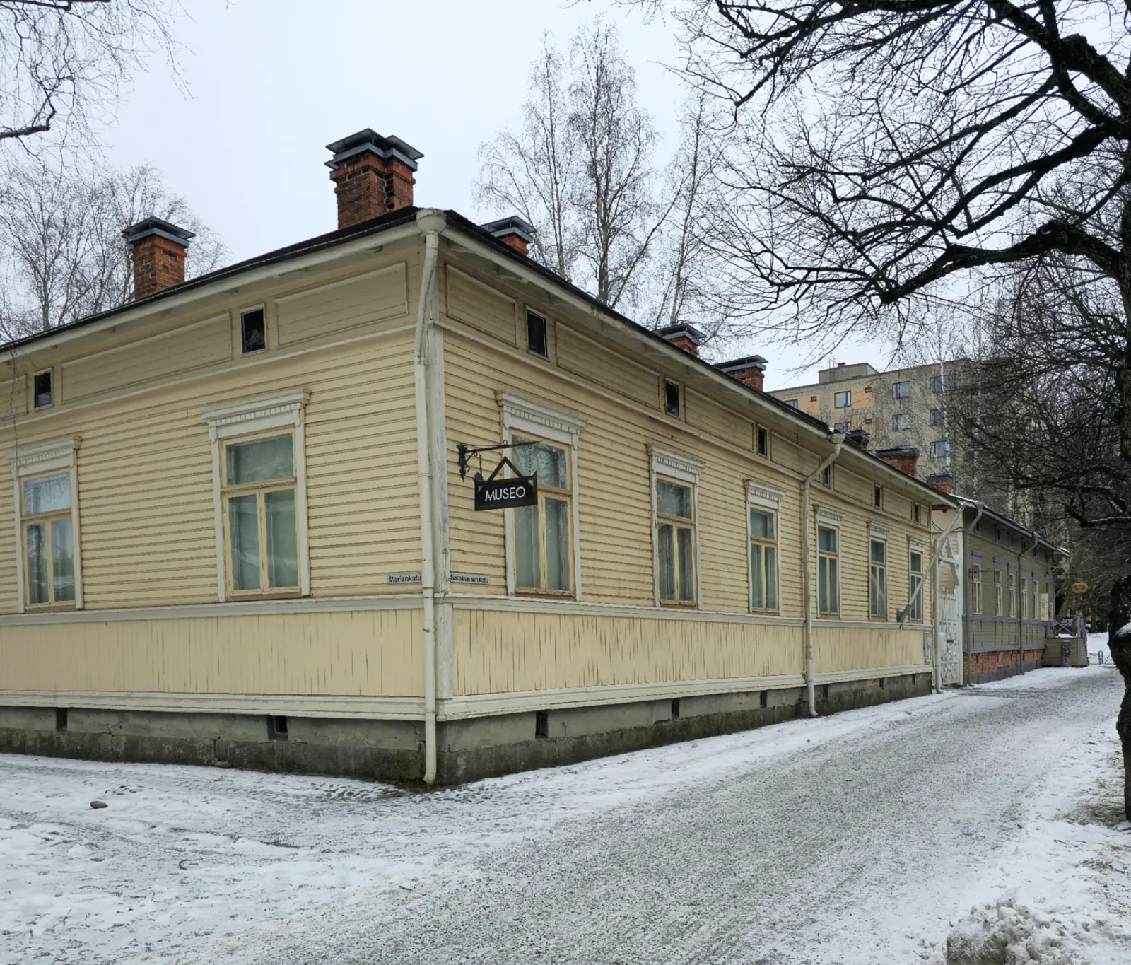 Wooden workers' housing block in Amuri, Tampere, in winter