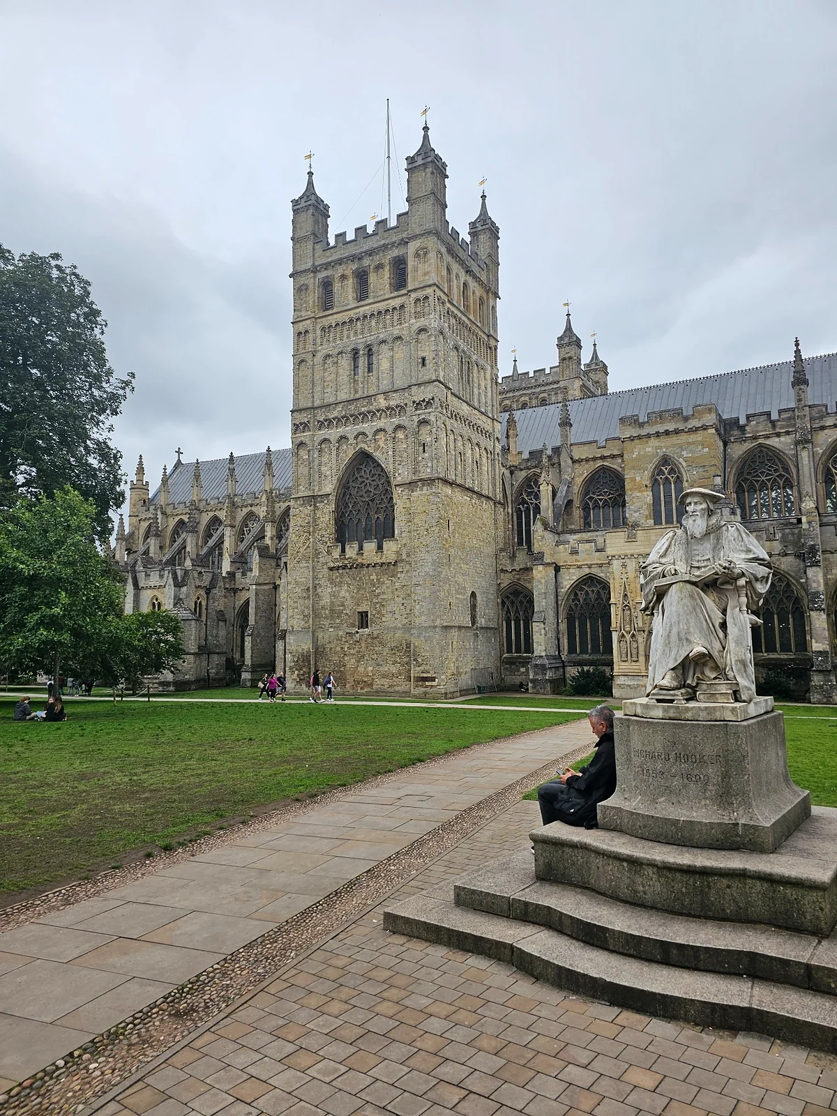 Exeter Cathedral with the statue of Richard Hooker in the foreground