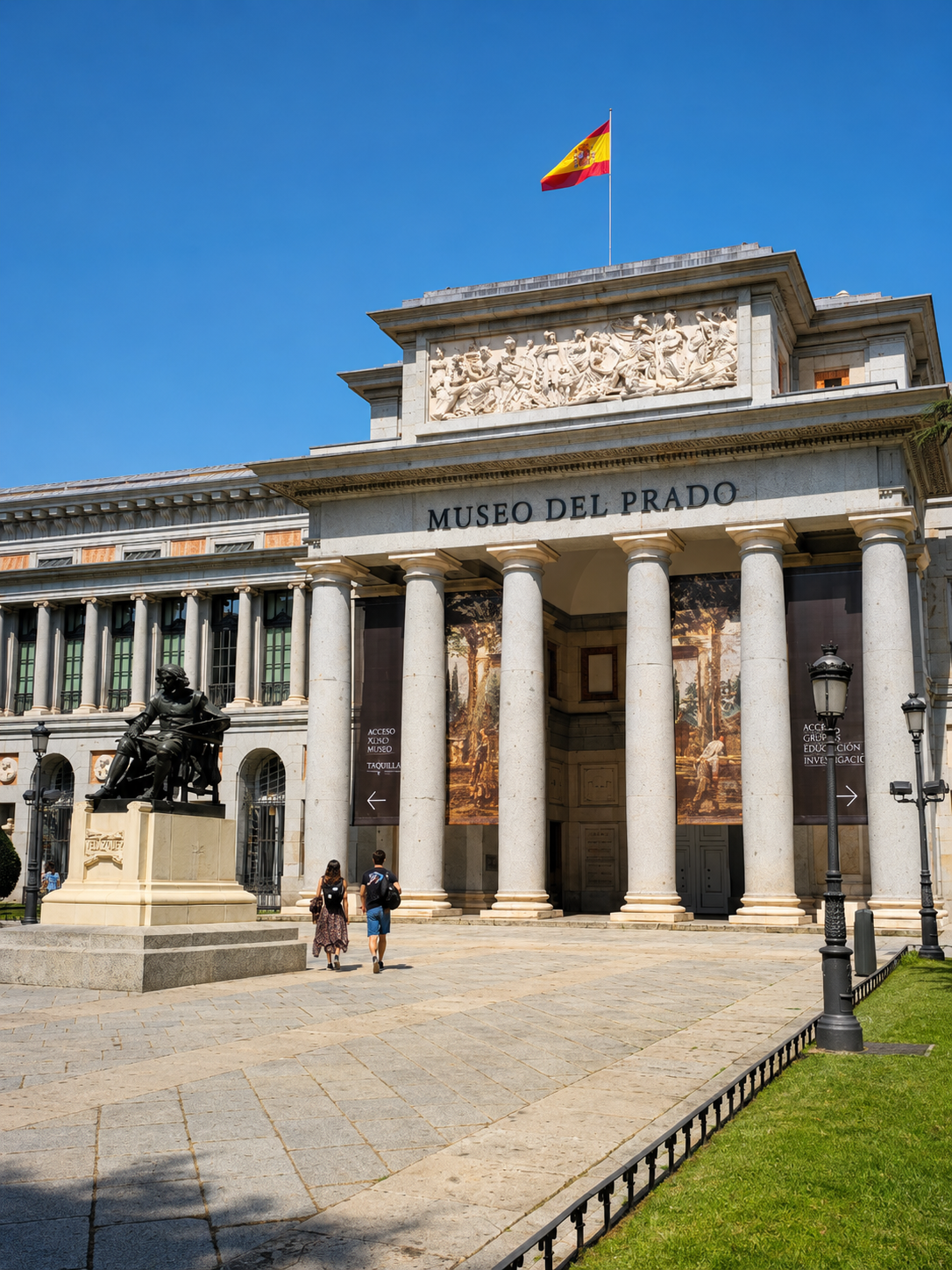 Museo del Prado in Madrid, with the museum façade and Spanish flag.