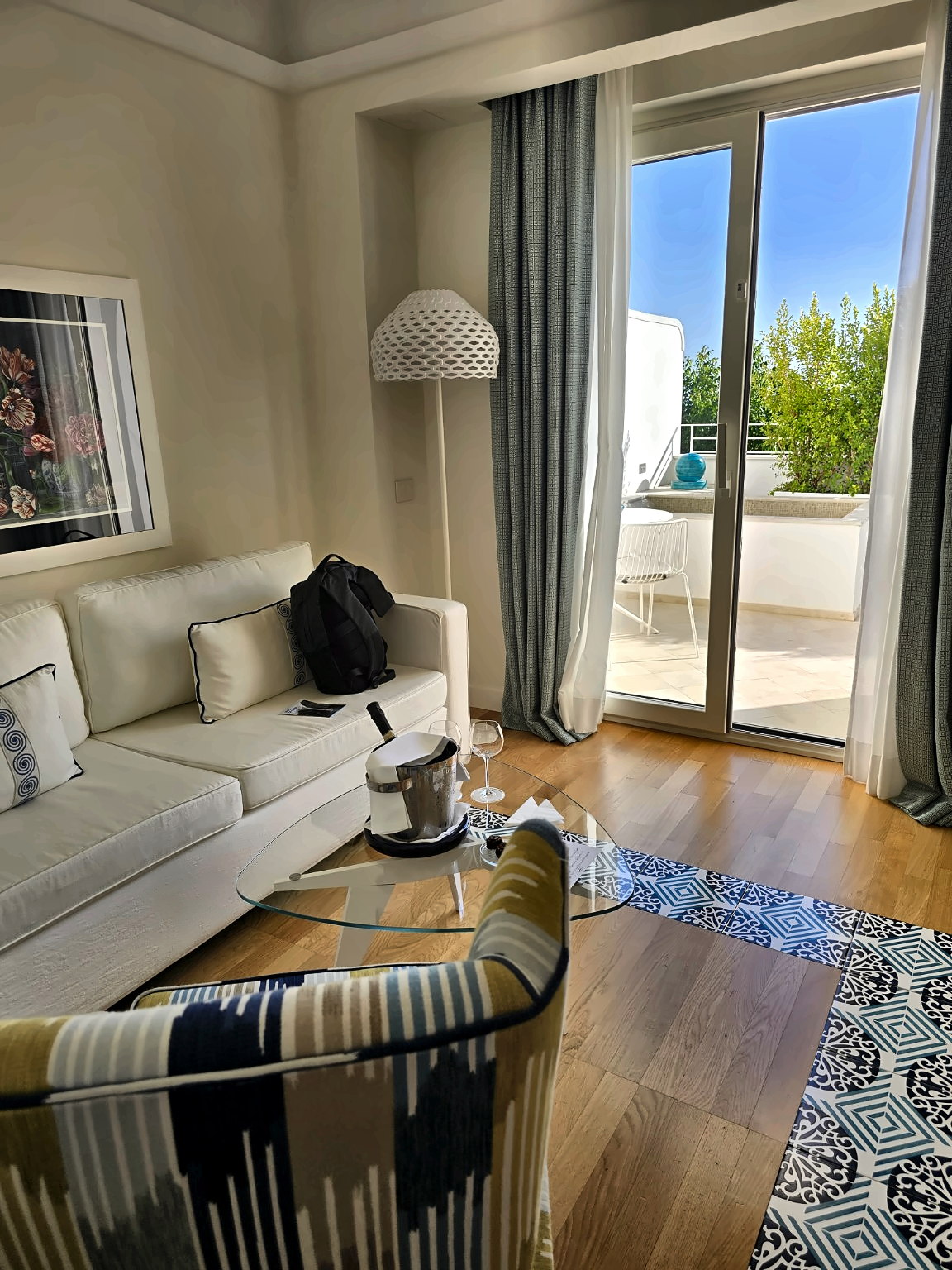 Living area of the Camerelle Suite looking towards the private terrace