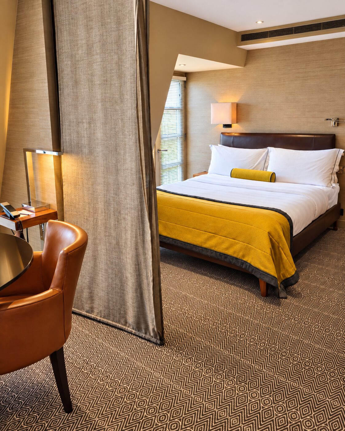 Sleeping area of a room at Threadneedles in London
