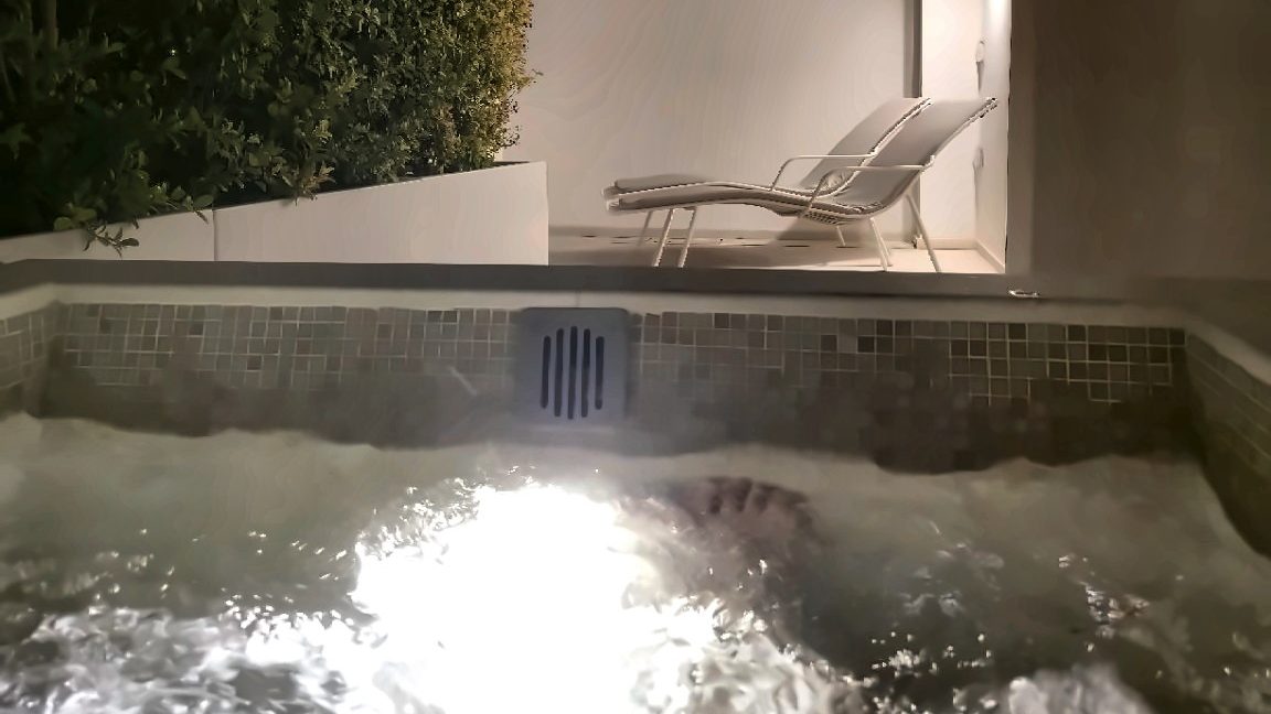Private whirlpool on the terrace of the Camerelle Suite at Pazziella Capri at night